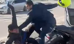 Bursa'da yol kavgası, motosiklet sürücüsünü kaskıyla dövdü  